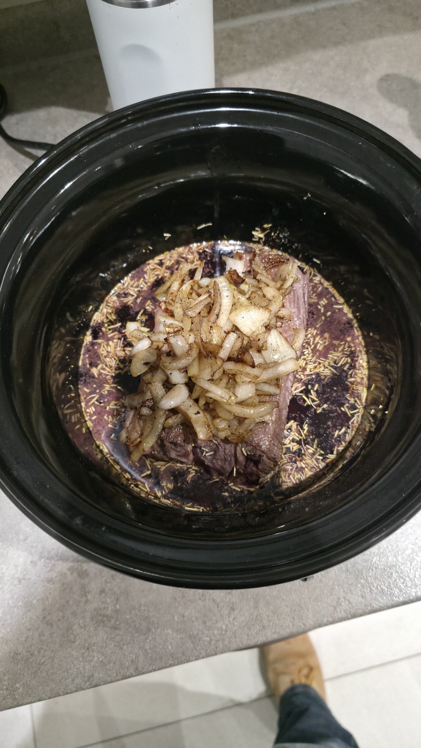 Short ribs, caramelised onions and dried rosemary in red wine before slow cooking